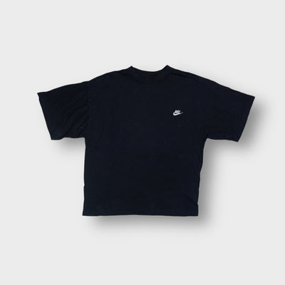 Nike T-Shirt in black featuring a white embroidered swoosh logo on the left chest
