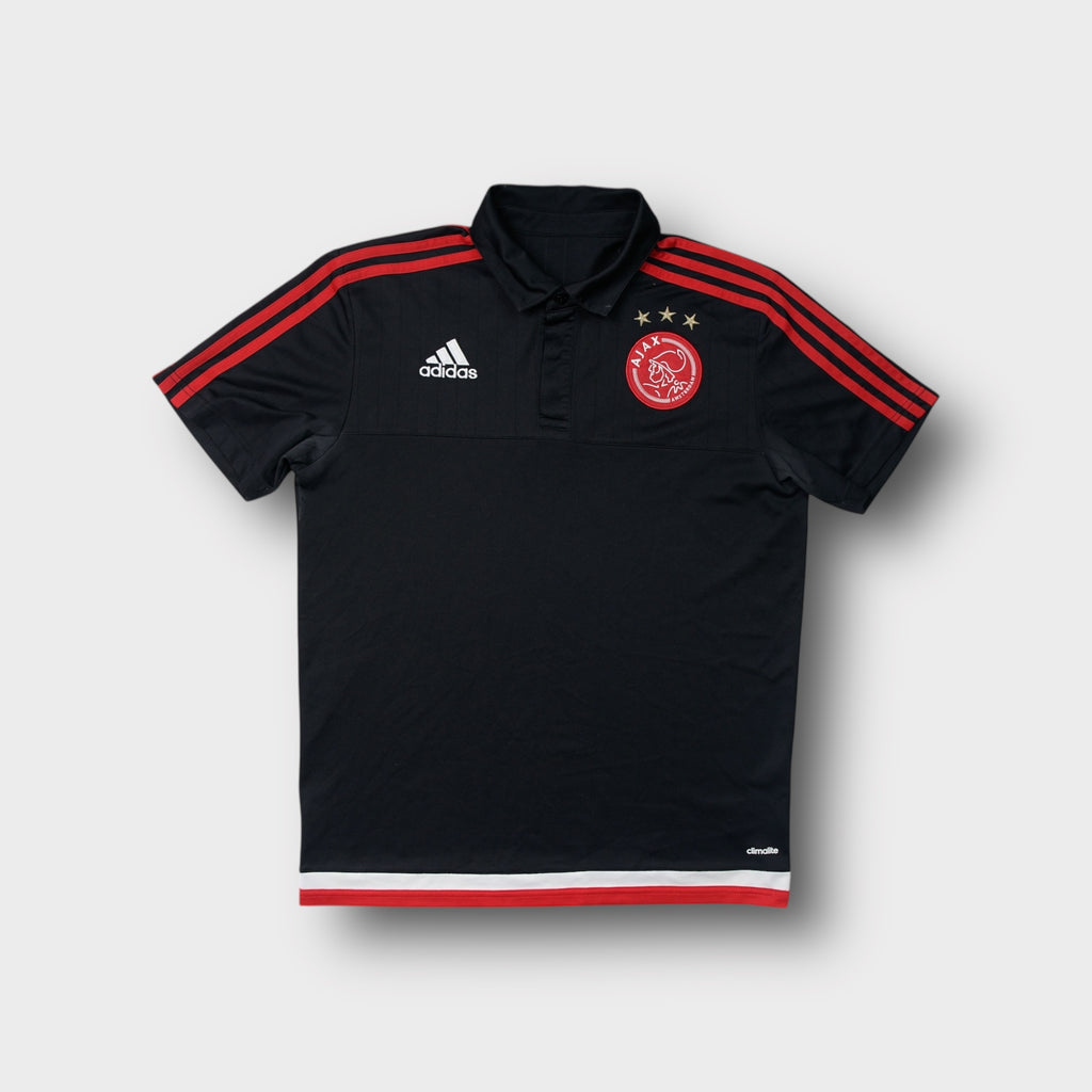 Adidas Ajax Amsterdam polo shirt in black with embroidered chest crest and red stripes.