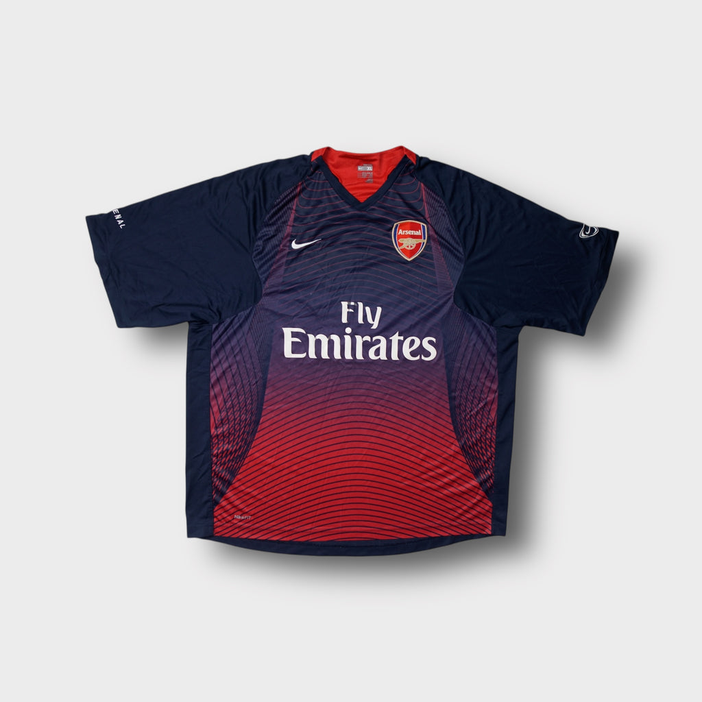 Nike FC Arsenal jersey in navy blue featuring Fly Emirates sponsor graphic on chest