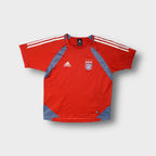Red Adidas FC Bayern Munich jersey with embroidered team crest and white stripes.