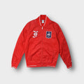 Nike full-zip jacket in red featuring a French Football Federation FFF crest patch.