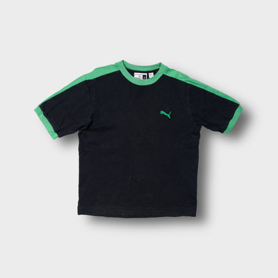 Puma T-Shirt in black with green collar trim, shoulder stripes, and embroidered logo
