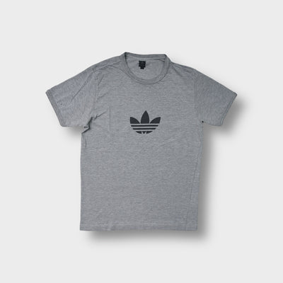 Adidas T-Shirt in grey featuring a black trefoil logo printed on the chest
