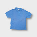 Lacoste short-sleeved polo shirt in blue with an embroidered crocodile patch on the chest