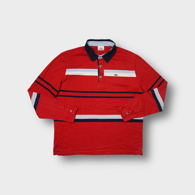 Lacoste long-sleeve polo sweater in red featuring chest stripes and embroidered crocodile logo.
