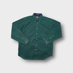 Green Tommy Hilfiger long-sleeve button-down shirt with chest pocket and embroidered crest