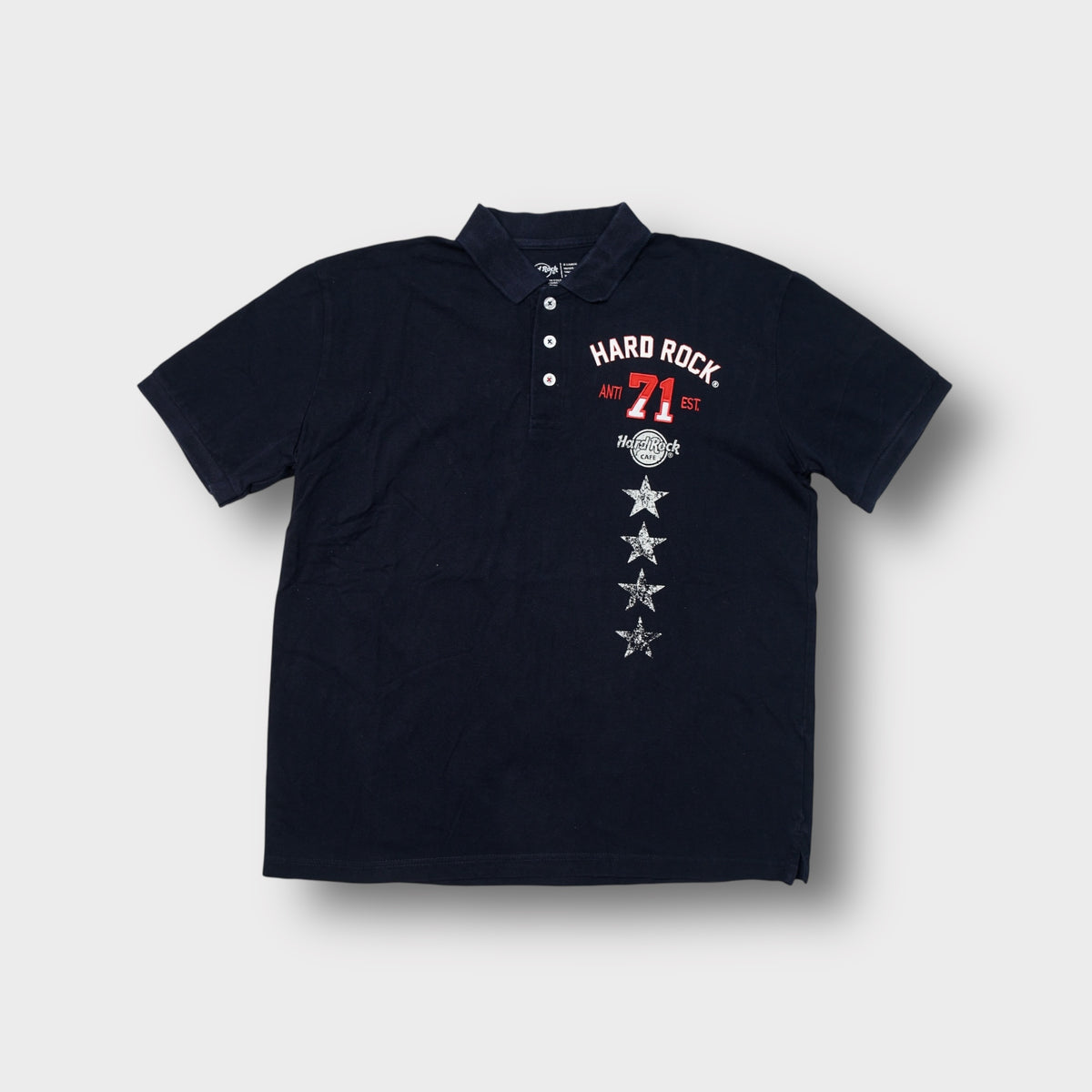 Hard Rock Cafe polo shirt in black with vertical chest print and Marbella back text