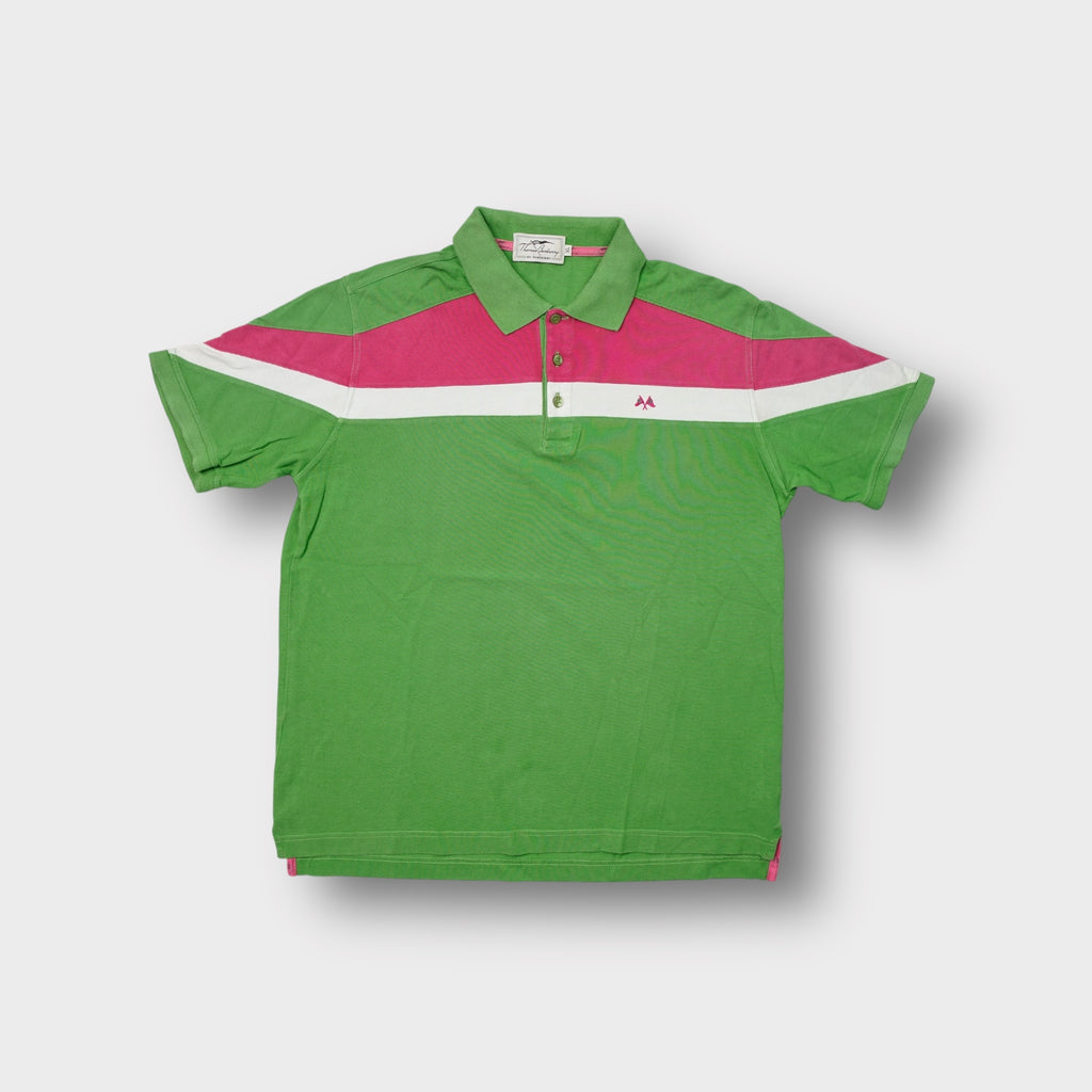 Burberry polo shirt in green featuring pink chest panel and embroidered flag logo