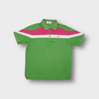 Burberry polo shirt in green featuring pink chest panel and embroidered flag logo