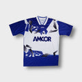 Jako football shirt in blue and white with geometric graphics and Amcor logo