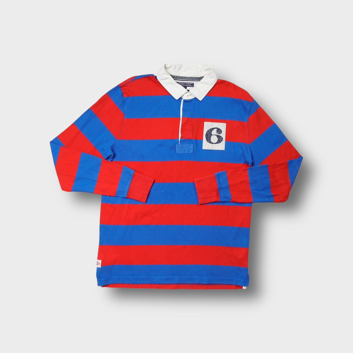 Tommy Hilfiger red and blue striped rugby sweater with white collar and number six patch