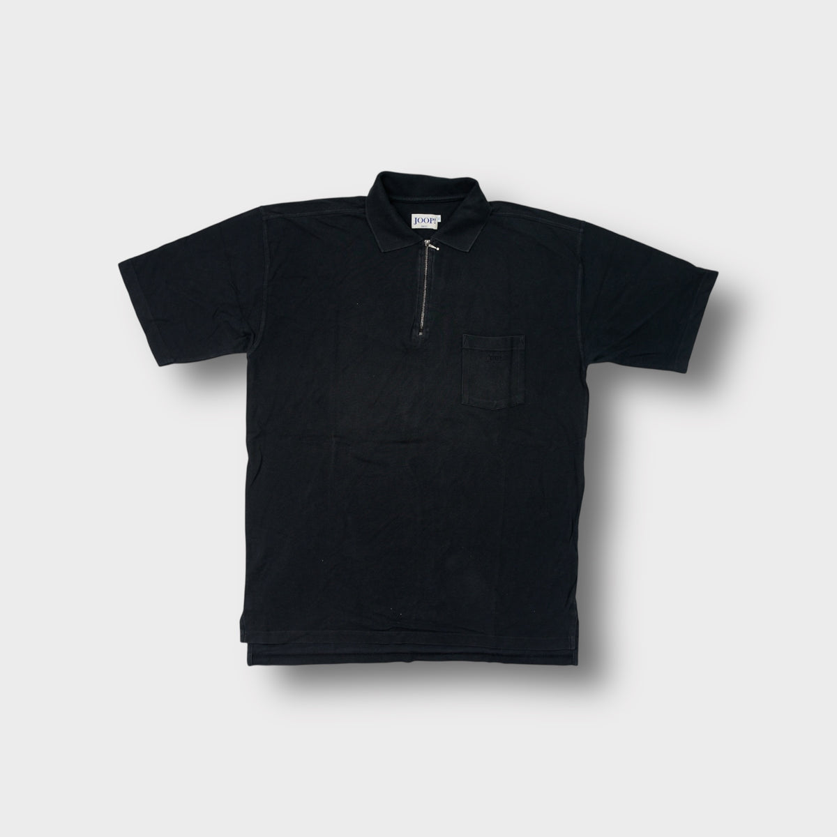 Joop short-sleeve polo shirt in black featuring a silver half-zip collar and chest pocket
