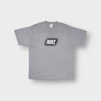 Nike grey T-Shirt with a black and white framed logo graphic on the chest