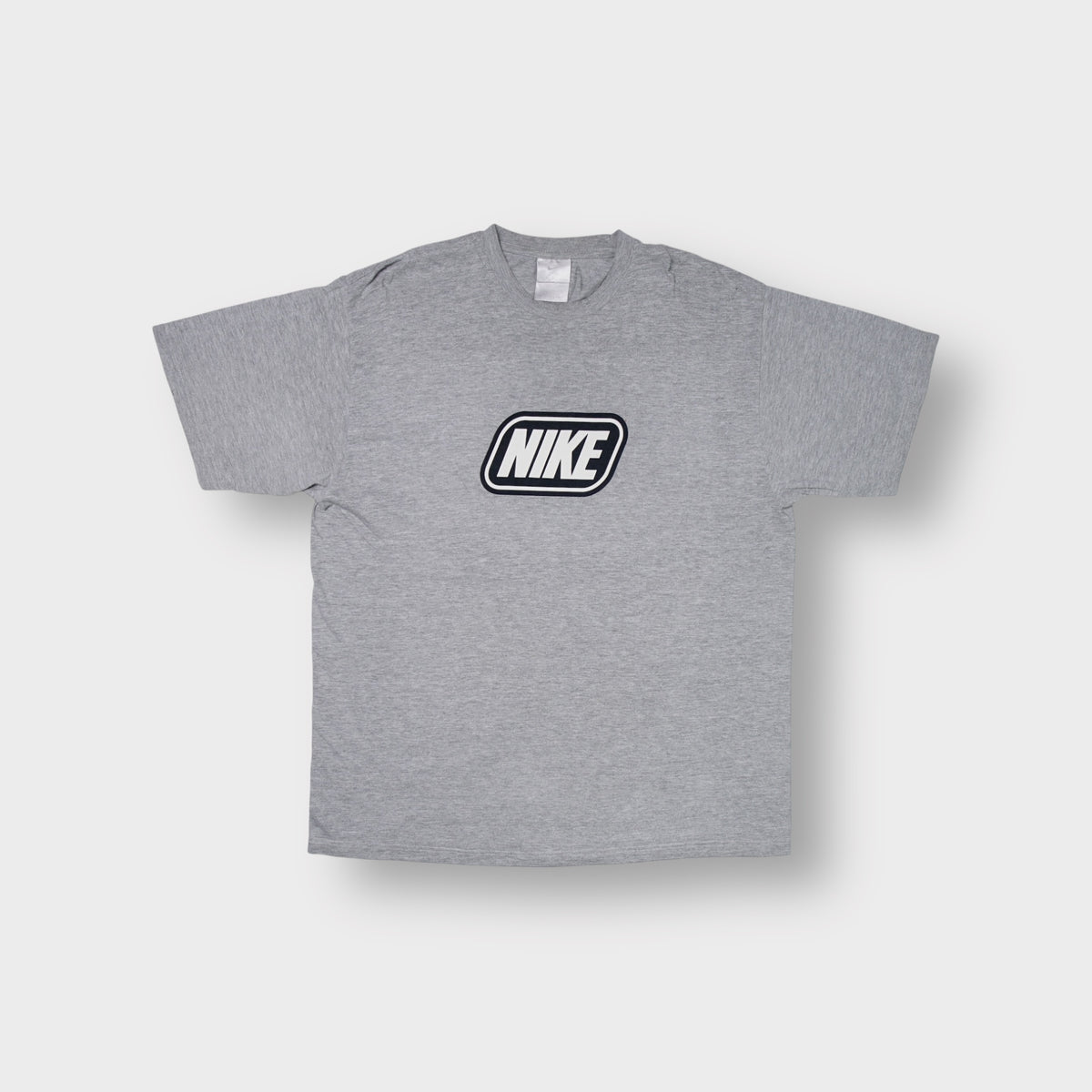Nike grey T-Shirt with a black and white framed logo graphic on the chest