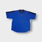 Blue Nike training shirt featuring a central swoosh crest on the chest