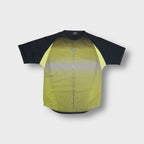 Nike grey and yellow sports T-Shirt with a wavy geometric line print and swoosh logo