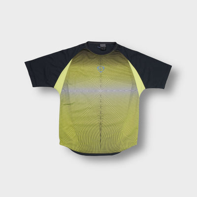 Nike grey and yellow sports T-Shirt with a wavy geometric line print and swoosh logo