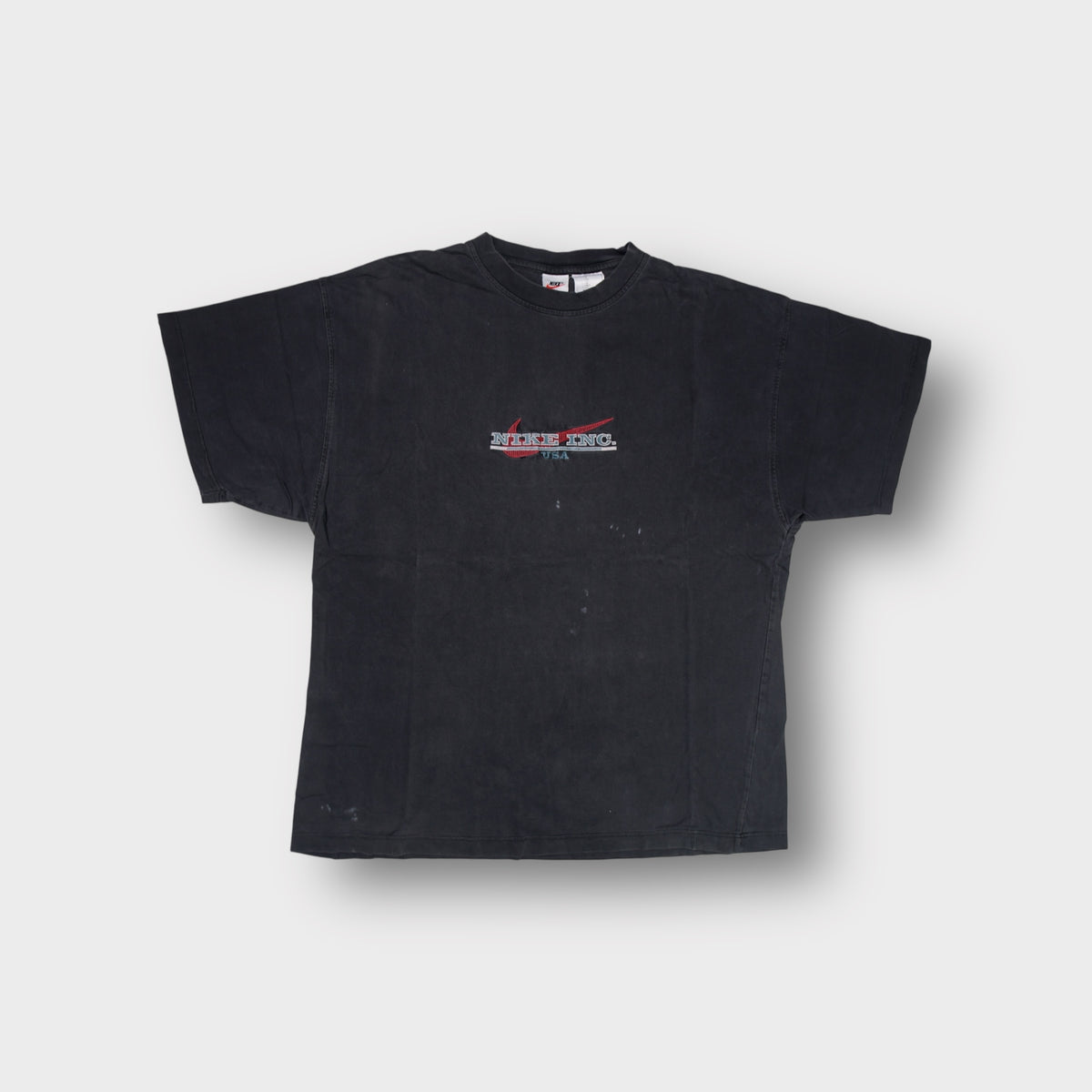 Dark grey Nike T-Shirt with embroidered Nike Inc. USA logo on the chest
