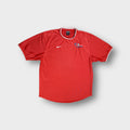 Nike football shirt in red featuring white swoosh and KNVB embroidery on chest