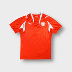 Puma Qviding FIF football jersey in red with white accents and crest badge
