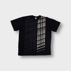 Black Nike Air T-Shirt with a grey vertical graphic print and small red swoosh