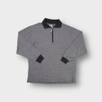 Grey Nike polo sweater with half-zip closure and dark contrast collar