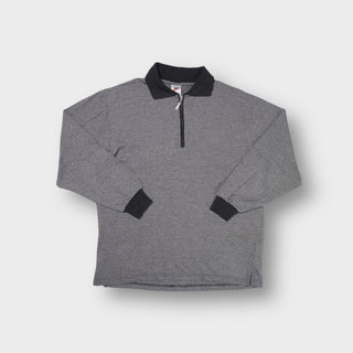 Grey Nike polo sweater with half-zip closure and dark contrast collar