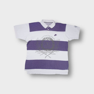 Nike polo shirt in white and purple with broad stripes and front graphic print