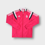 Adidas pink Real Madrid track jacket featuring embroidered white crest on chest