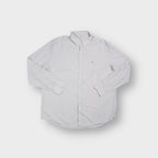 Lacoste long sleeve shirt in off white with embroidered crocodile logo on chest