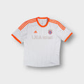 Adidas FC Bayern 2012-13 away football jersey in white with orange trim and chest crest