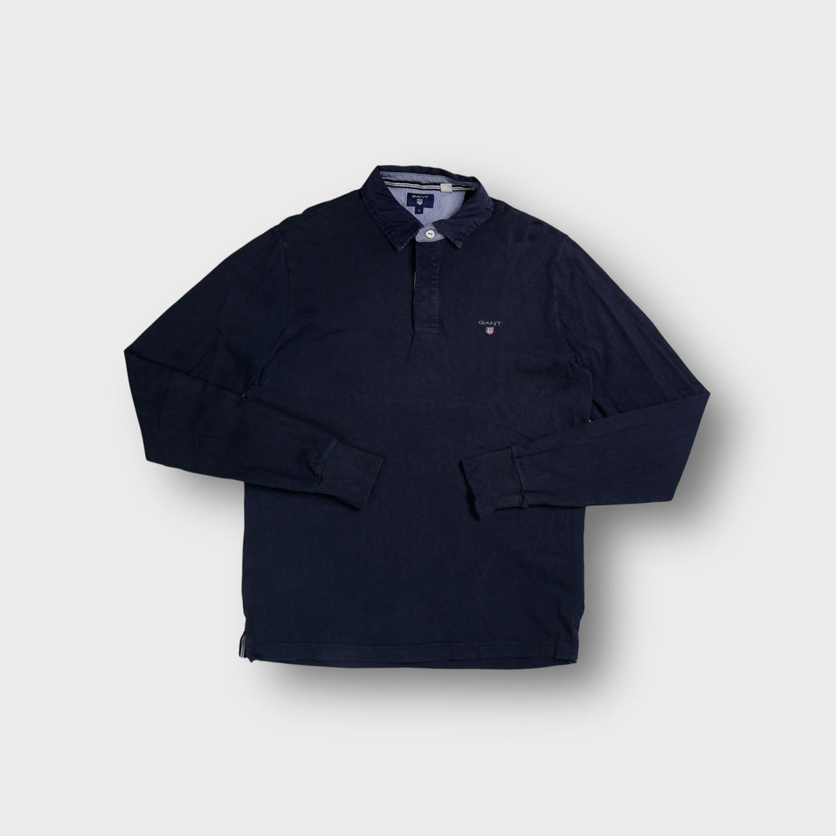 Gant long-sleeve polo sweater in navy blue with embroidered chest logo