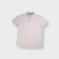 Tommy Hilfiger polo shirt in pink featuring small embroidered flag chest logo