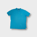 Ralph Lauren polo shirt in blue with a small yellow embroidered logo on the chest