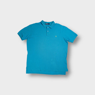 Ralph Lauren polo shirt in blue with a small yellow embroidered logo on the chest