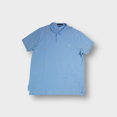 Ralph Lauren polo shirt in blue with yellow pony embroidery on the chest