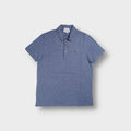 Blue Lacoste polo shirt with embroidered crocodile logo on the chest