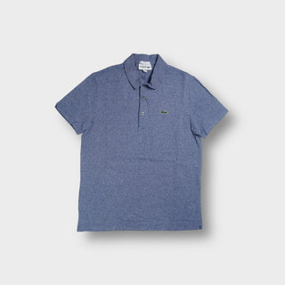 Blue Lacoste polo shirt with embroidered crocodile logo on the chest