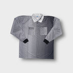 White Adidas long-sleeve referee jersey with a geometric grid print and collar