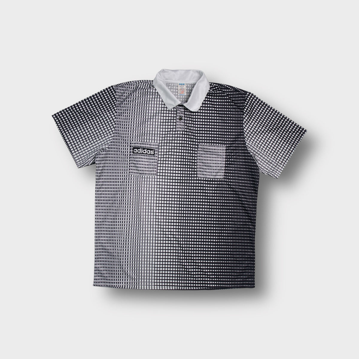 Adidas referee jersey in white with black checkerboard gradient print and white collar