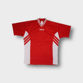 Vintage Adidas red jersey with white striped V-neck collar and chest logo