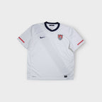 White Nike USA national football team jersey with embroidered crest and navy collar