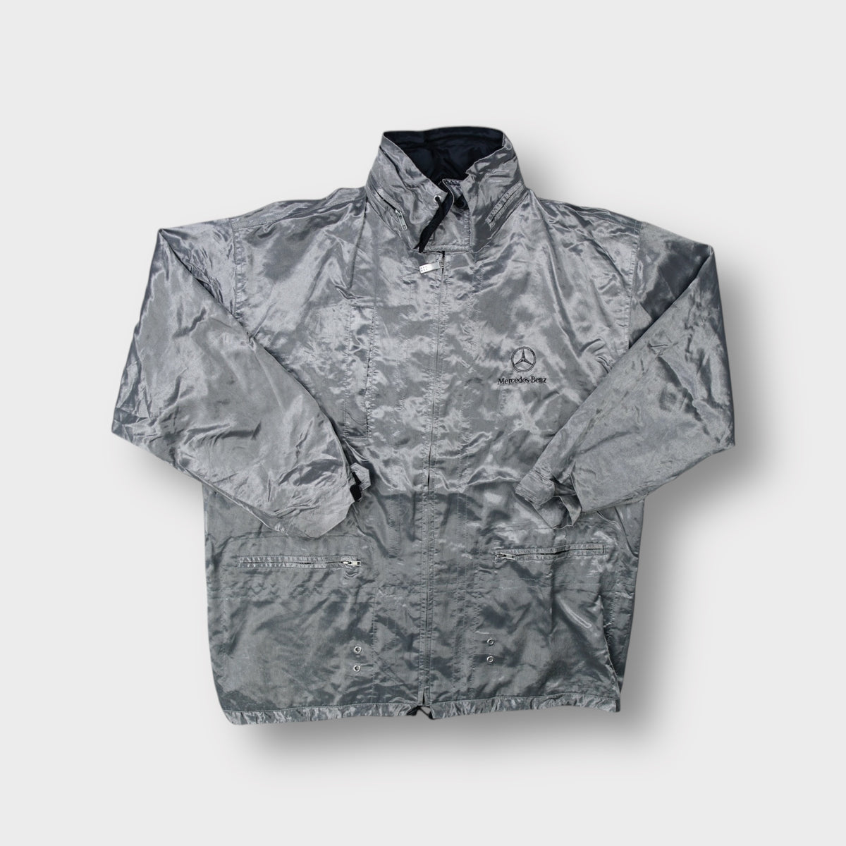 Mercedes Benz silver jacket featuring an embroidered logo on the left chest