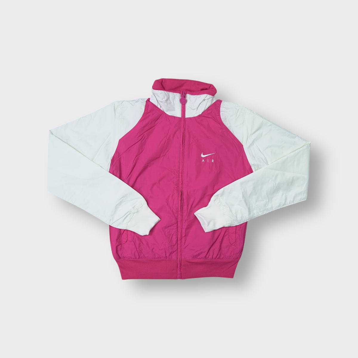 Nike track jacket in pink and white with embroidered chest logo