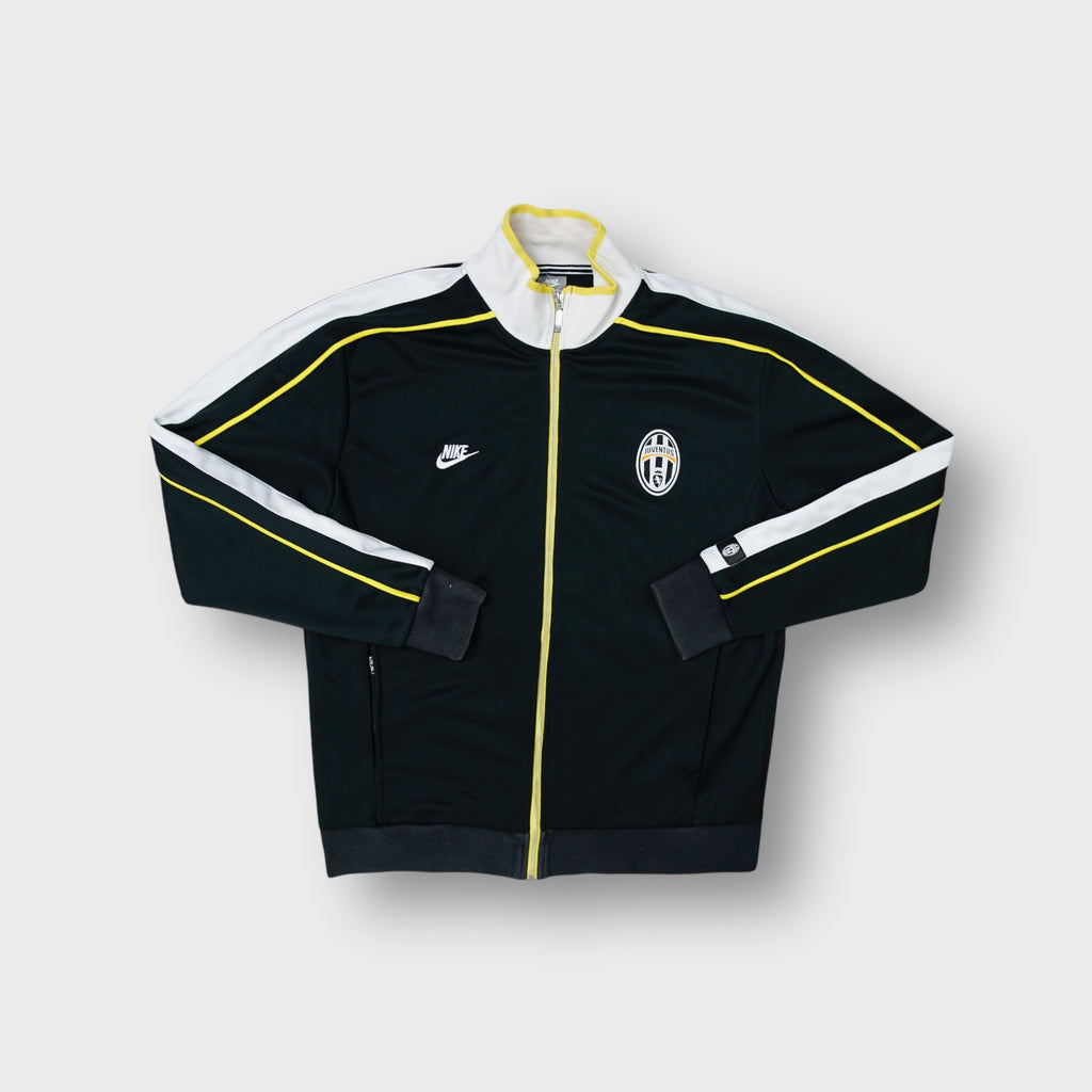 Nike Juventus track jacket in black with embroidered club crest and white shoulder trim