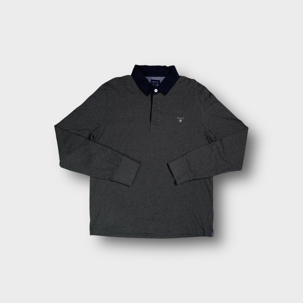 Dark grey Gant long-sleeve polo sweater with a dark blue collar and chest logo.