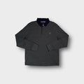 Dark grey Gant long-sleeve polo sweater with a dark blue collar and chest logo.