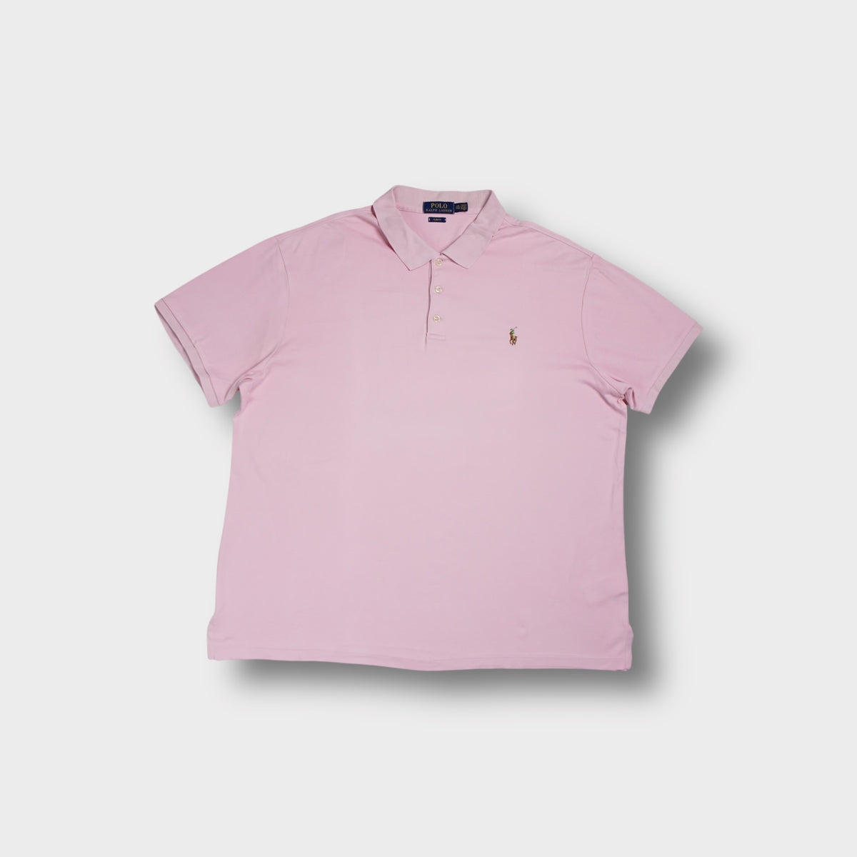 Ralph Lauren short-sleeve polo shirt in pink with an embroidered pony logo on the chest