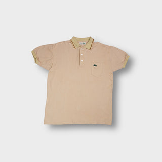 Beige Lacoste polo shirt with contrasting tipped collar and chest pocket patch