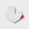 Sergio Tacchini white trackpants with red lower leg inserts and side zip pockets